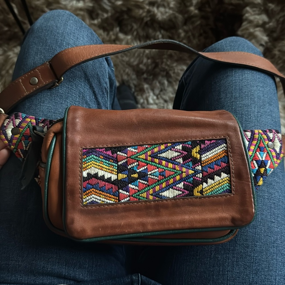 Unique Guatemalan leather sling bag with hand woven accents